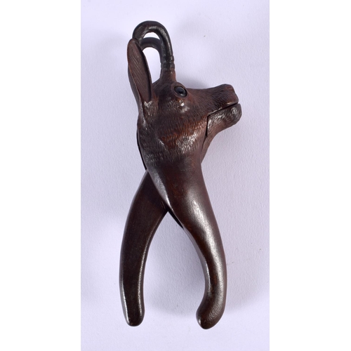 323 - A PAIR OF ANTIQUE BAVARIAN BLACK FOREST CARVED WOOD NUT CRACKERS formed as a deer. 15 cm long.