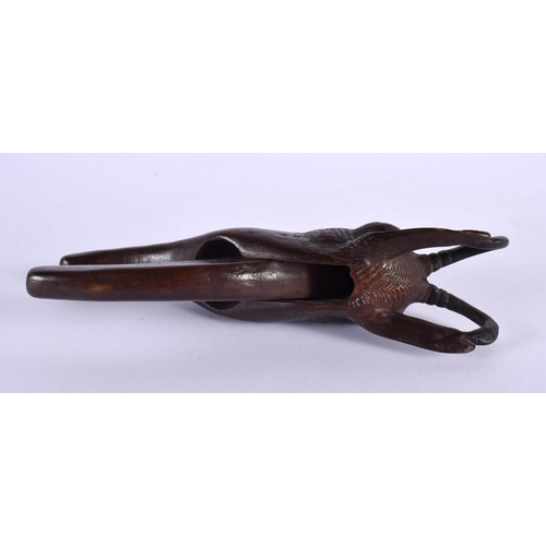 323 - A PAIR OF ANTIQUE BAVARIAN BLACK FOREST CARVED WOOD NUT CRACKERS formed as a deer. 15 cm long.