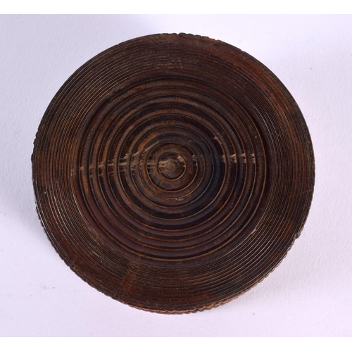 324 - AN ANTIQUE CONTINENTAL TREEN FRUITWOOD INCENSE BURNER decorated with roundels. 9.5 cm diameter.