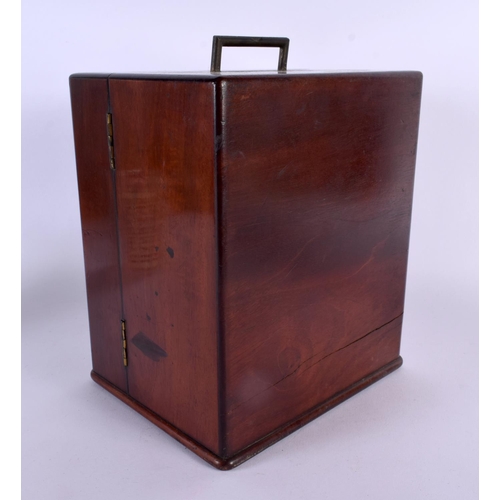 328 - AN EARLY VICTORIAN MAHOGANY APOTHECARY SET with partial contents. 24 cm x 18 cm closed.