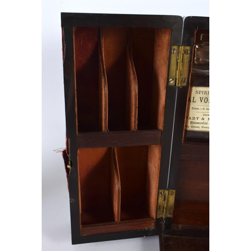 328 - AN EARLY VICTORIAN MAHOGANY APOTHECARY SET with partial contents. 24 cm x 18 cm closed.