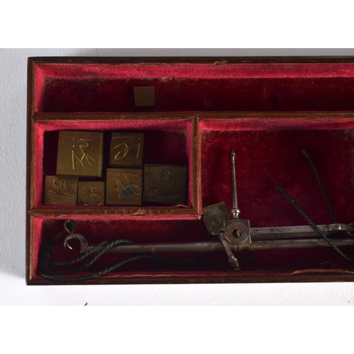 328 - AN EARLY VICTORIAN MAHOGANY APOTHECARY SET with partial contents. 24 cm x 18 cm closed.