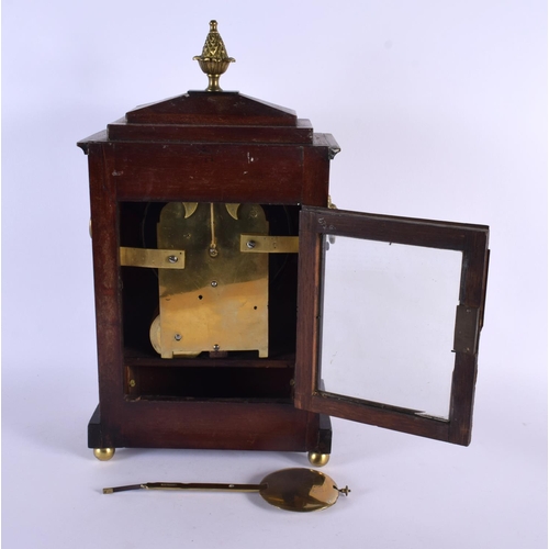 330 - A REGENCY MAHOGANY BRASS INLAID MANTEL CLOCK by Stafford of London. 42 cm x 20 cm.