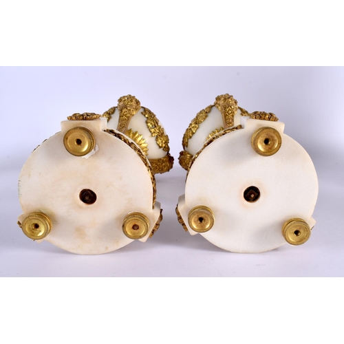 331 - A PAIR OF 19TH CENTURY FRENCH ORMOLU AND WHITE MARBLE VASES AND COVERS mounted with mask heads and h... 