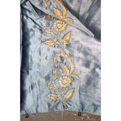 332 - A MIDDLE EASTERN TURKISH SILK BLUE TEXTILE decorated with flowers. 95 cm square.