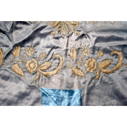 332 - A MIDDLE EASTERN TURKISH SILK BLUE TEXTILE decorated with flowers. 95 cm square.