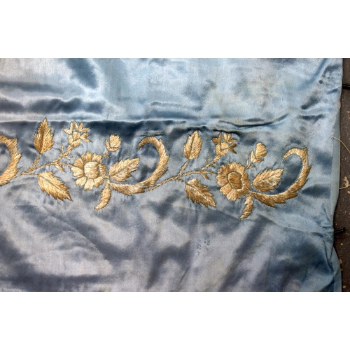 332 - A MIDDLE EASTERN TURKISH SILK BLUE TEXTILE decorated with flowers. 95 cm square.