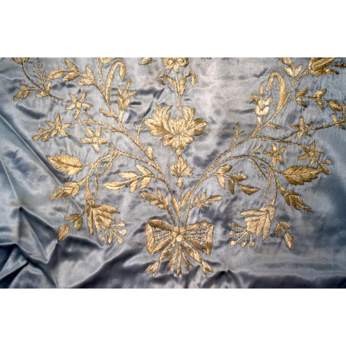 332 - A MIDDLE EASTERN TURKISH SILK BLUE TEXTILE decorated with flowers. 95 cm square.