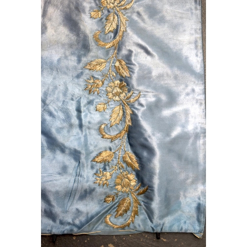 332 - A MIDDLE EASTERN TURKISH SILK BLUE TEXTILE decorated with flowers. 95 cm square.