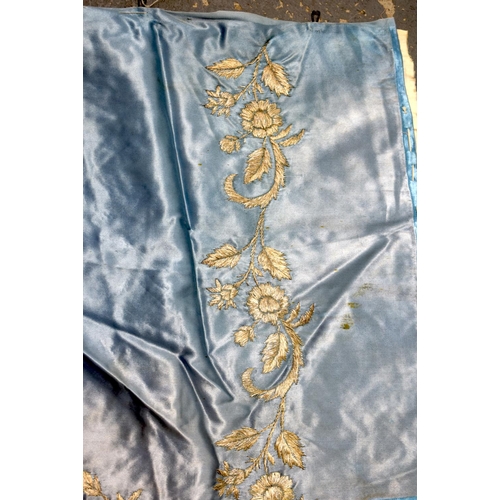 332 - A MIDDLE EASTERN TURKISH SILK BLUE TEXTILE decorated with flowers. 95 cm square.