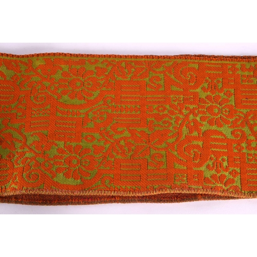 334 - A 19TH CENTURY TURKISH ORANGE AND RED SILK EMBROIDERED BELT decorated with gold motifs. 280 cm long ... 