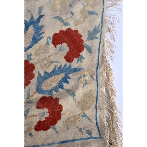 336 - A GOOD 17TH CENTURY TURKISH IZNIK SILK EMBROIDERED TEXTILE depicting red and blue foliage. 155 cm x ... 