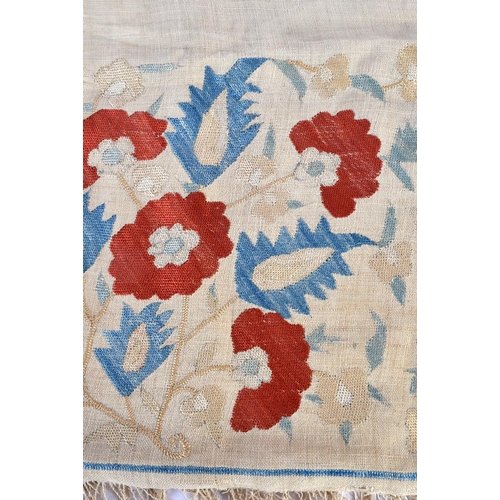 336 - A GOOD 17TH CENTURY TURKISH IZNIK SILK EMBROIDERED TEXTILE depicting red and blue foliage. 155 cm x ... 