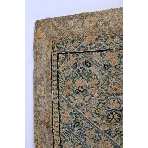 342 - AN ANTIQUE CONTINENTAL EMBROIDERED SILK TEXTILE depicting angular panels foliage. 75 cm x 55 cm.