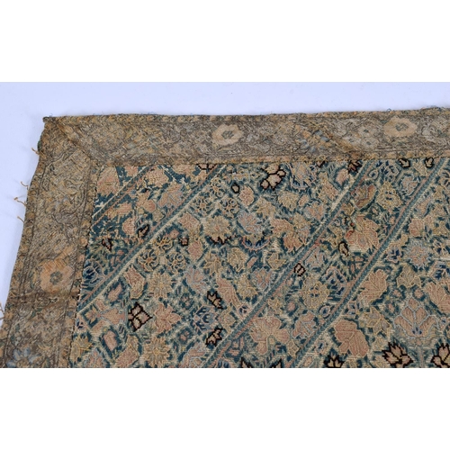 342 - AN ANTIQUE CONTINENTAL EMBROIDERED SILK TEXTILE depicting angular panels foliage. 75 cm x 55 cm.