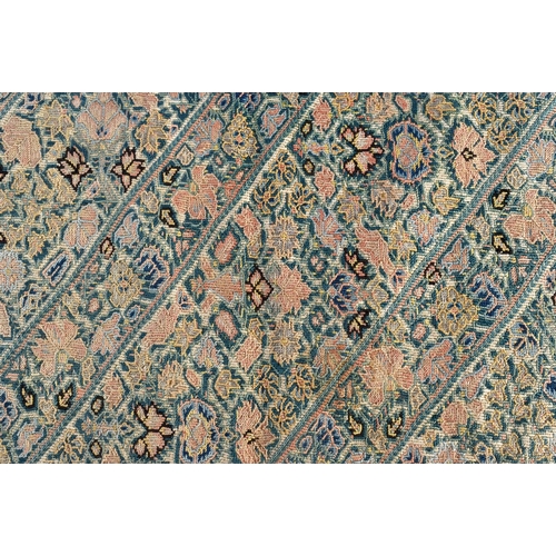 342 - AN ANTIQUE CONTINENTAL EMBROIDERED SILK TEXTILE depicting angular panels foliage. 75 cm x 55 cm.