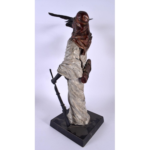 357 - A LARGE CONTEMPORARY CONTINENTAL COLD PAINTED BRONZE HUNTER modelled holding a bird and rifle. 40 cm... 