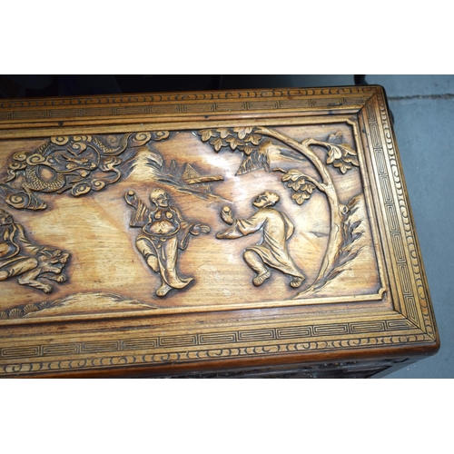 363 - A LARGE 19TH CENTURY CHINESE CARVED HARDWOOD COFFER Qing, carved with figures in landscapes. 90 cm x... 