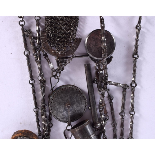 364 - A RARE EXTENSIVE GEORGE III STEEL CUT CHATELAINE with numerous tools. 52 cm long.