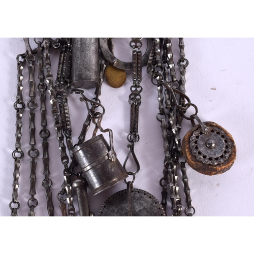 364 - A RARE EXTENSIVE GEORGE III STEEL CUT CHATELAINE with numerous tools. 52 cm long.