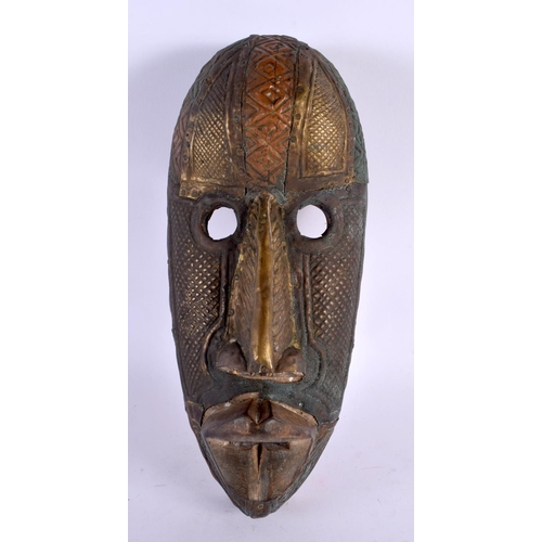 368 - A TRIBAL CONGOLESE AFRICAN METAL BOUND WOOD MASK. 30 cm x 8 cm.