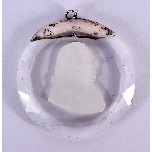 375 - AN 18TH CENTURY FRENCH SILVER MOUNTED SULPHITE CRYSTAL CAMEO PENDANT. 7.5 cm wide.