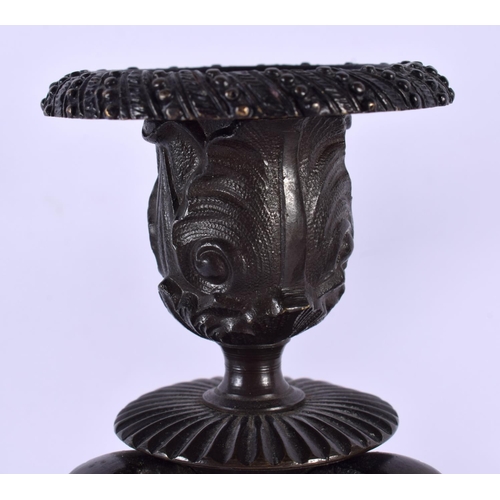 378 - A PAIR OF 19TH CENTURY EUROPEAN BRONZE CANDLESTICKS formed with bird heads. 21 cm high.