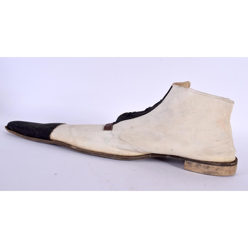 387 - A PAIR OF EDWARDIAN CLOWNS BOOTS. 40 cm x 14 cm.