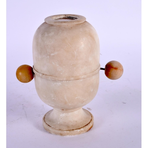 390 - A RARE EARLY 20TH CENTURY CARVED ALABASTER DIORAMA with revolving pictures. 12 cm x 8 cm.