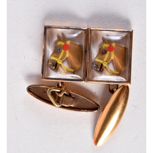 1002 - A PAIR OF ART DECO HORSE RACING REVERSE PAINTED CUFFLINKS. 6 grams. 1.25 cm x 1.5 cm.