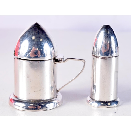 1003 - A PAIR OF ART DECO SILVER AMMO SHELL CONDIMENTS. Birmingham 1944. 100.6 grams. 5 cm x 3 cm.