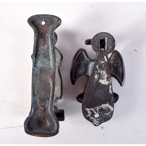 1013 - TWO ANTIQUE BRONZE DOOR KNOCKERS. 8.25 cm x 2.75 cm. (2)