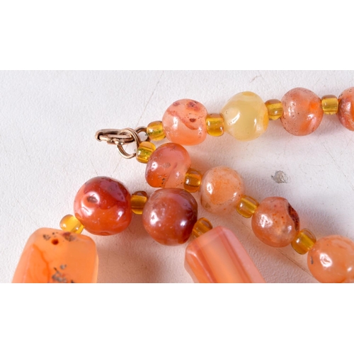 1014 - A LONG AGATE NECKLACE. 134 grams. 120 cm long.