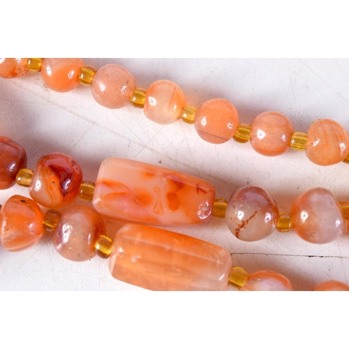 1014 - A LONG AGATE NECKLACE. 134 grams. 120 cm long.