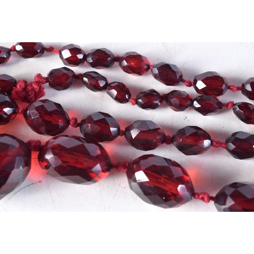 1016 - A CHERRY AMBER TYPE NECKLACE. 61 grams. 96 cm long.