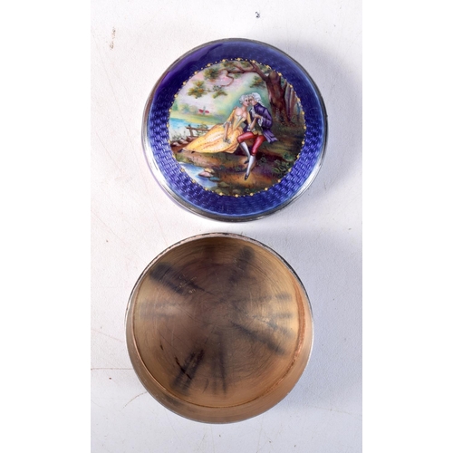 1035 - AN ANTIQUE SILVER AND ENAMEL BOX AND COVER. 82.5 grams. 6 cm diameter.