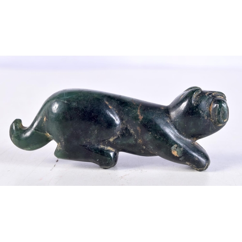 1061 - A MIDDLE EASTERN CARVED JADE BEAST. 9.25 cm x 3.5 cm.