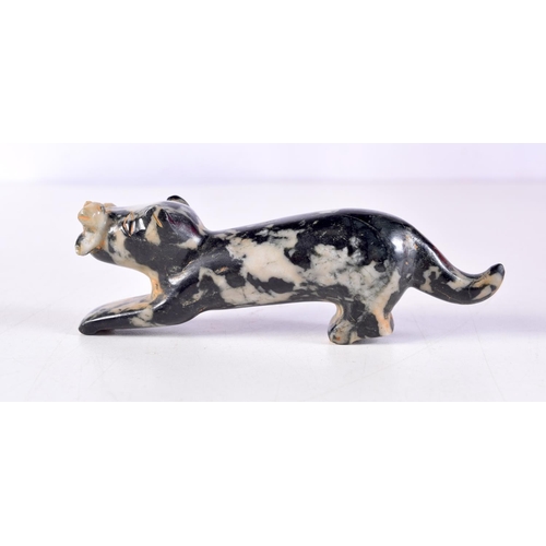 1077 - A MIDDLE EASTERN CARVED JADE BEAST. 11 cm x 3.25 cm.