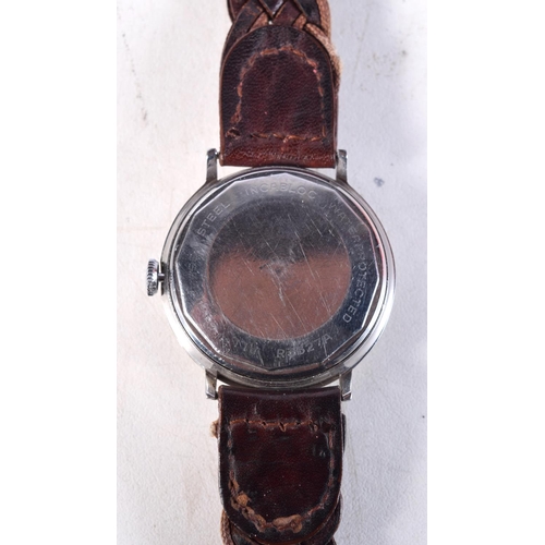 1079 - A JULES JORGENSEN WRISTWATCH. 3.5 cm wide inc crown.