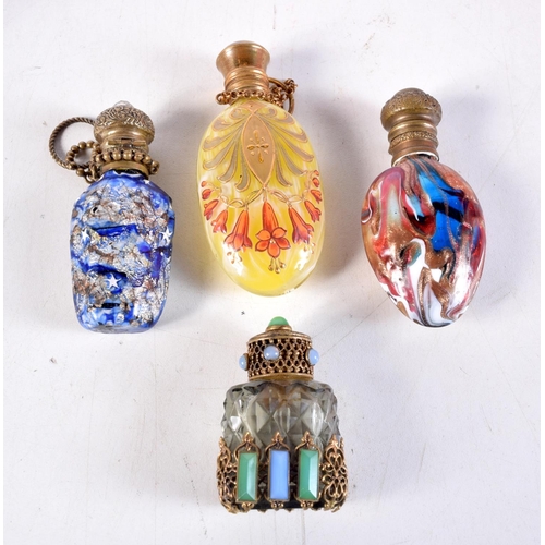 1084 - FOUR ANTIQUE SCENT BOTTLES. Largest 8.25 cm x 3.5 cm. (4)