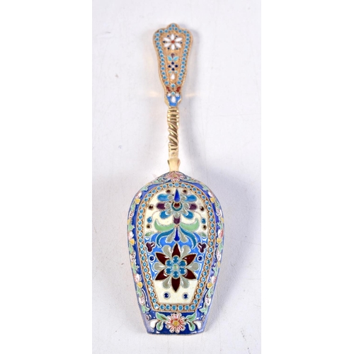 1086 - A CONTINENTAL SILVER AND ENAMEL SPOON.40.6 grams. 13 cm long.