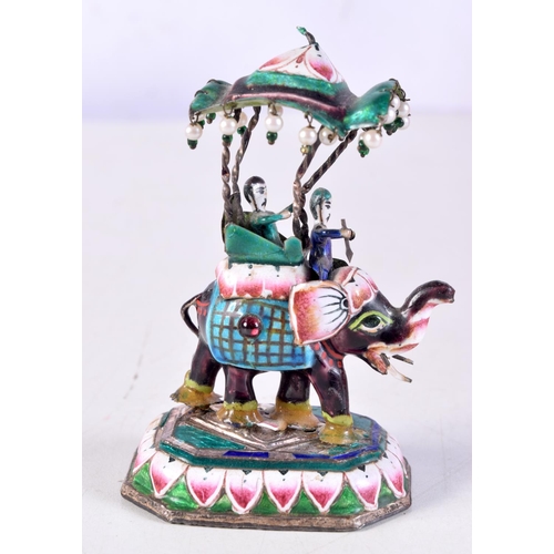 1093 - AN INDIAN SILVER AND ENAMEL ELEPHANT. 100 grams. 9.75 cm x 6 cm.