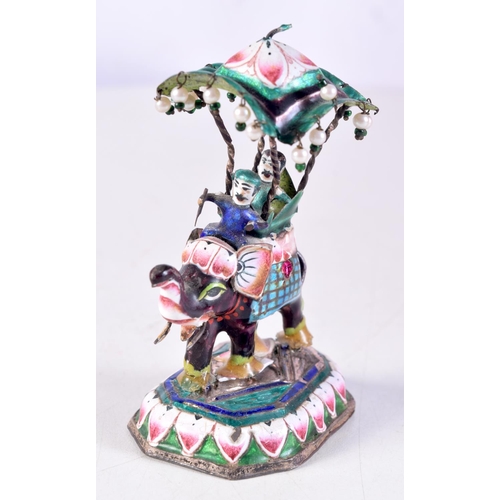 1093 - AN INDIAN SILVER AND ENAMEL ELEPHANT. 100 grams. 9.75 cm x 6 cm.