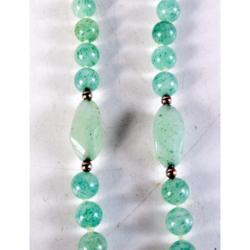 1098 - A CHINESE JADEITE NECKLACE. 72.4 grams. 82 cm long.