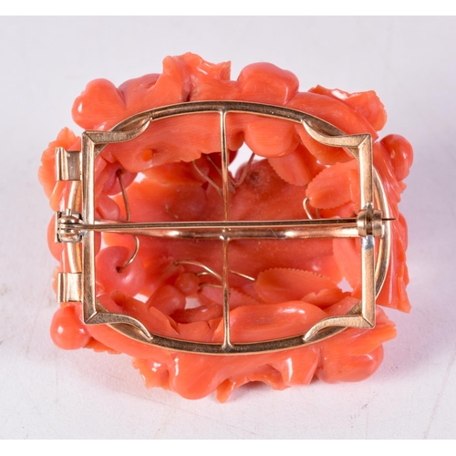 1101 - A VERY LARGE ANTIQUE GOLD AND CORAL BROOCH. 46.5 grams. 5.5 cm x 5 cm.