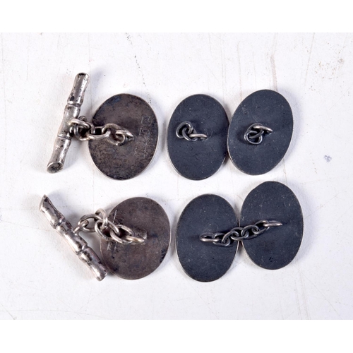 1113 - THREE PAIRS OF CHINESE SILVER CUFFLINKS. 15.3 grams. 1.5 cm x 1.8 cm. (6)