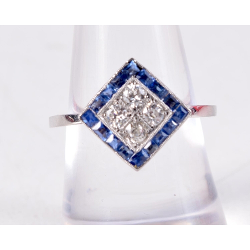 1124 - AN ART DECO GOLD DIAMOND AND SAPPHIRE RING. N. 3.6 grams. Ring head 1 cm square.