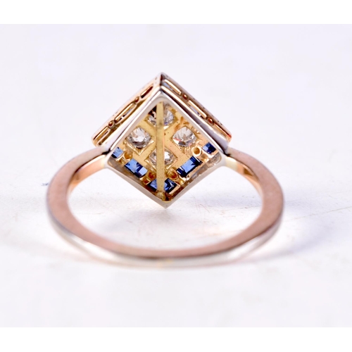 1124 - AN ART DECO GOLD DIAMOND AND SAPPHIRE RING. N. 3.6 grams. Ring head 1 cm square.