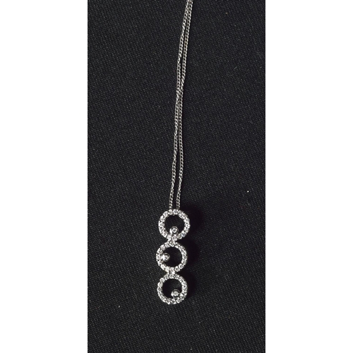 1131 - AN 18CT GOLD AND DIAMOND NECKLACE. 3 grams. 50 cm long.