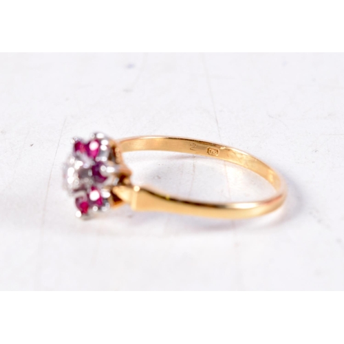 1147 - AN 18T GOLD RUBY AND DIAMOND RING. 2.3 grams. N.